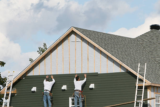 Professional Siding technician working in Coburn, PA